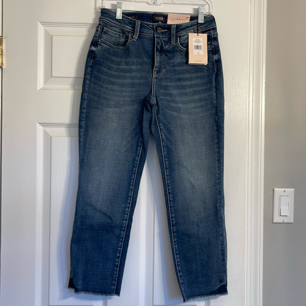 Never worn!! NYDJ frayed ankle length jeans.